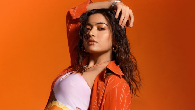 Rashmika Mandanna Orange background