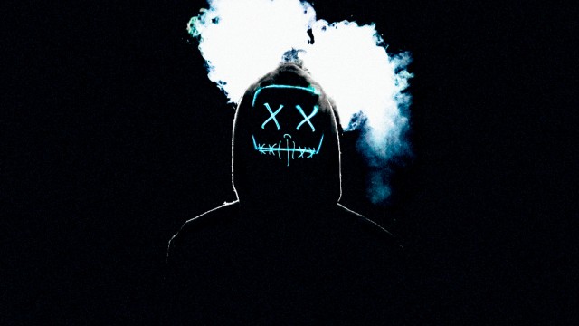 Man with LED Mask and Smoke