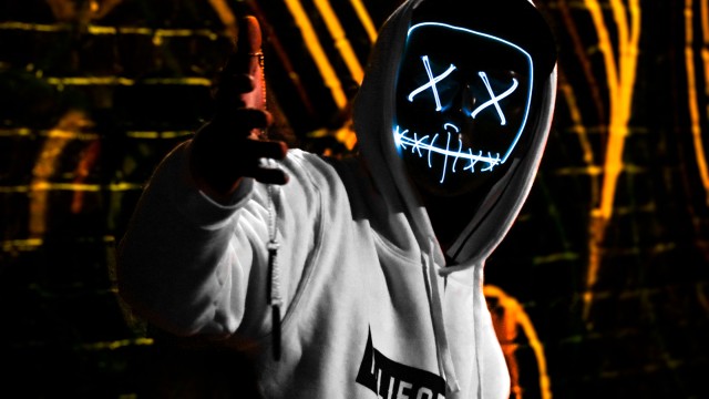 Man with LED mask in Hoodie 5K