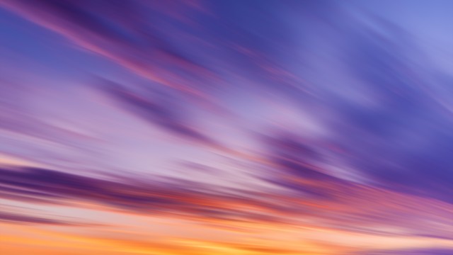 Sunset sky with purple and orange clouds