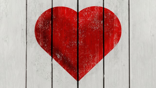 Red heart Wooden background